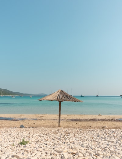 Beige wood umbrella
